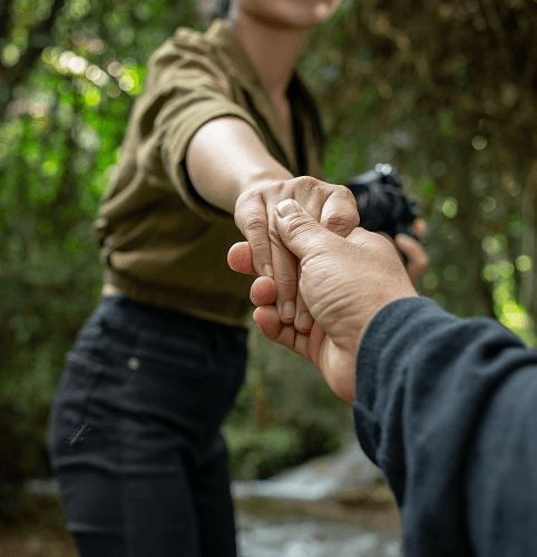 Hands reaching out — partnership and collaboration